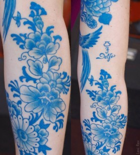 Pretty delfi blue flowers tattoos
