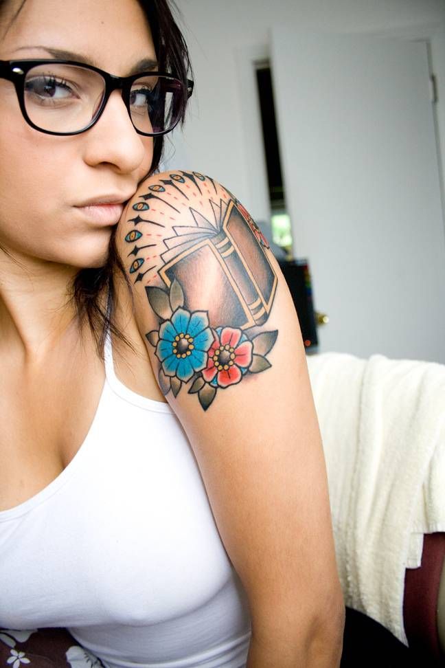 Pretty Girl With Glasses Book Tattoo On Arm -  Tattoomagz -8577