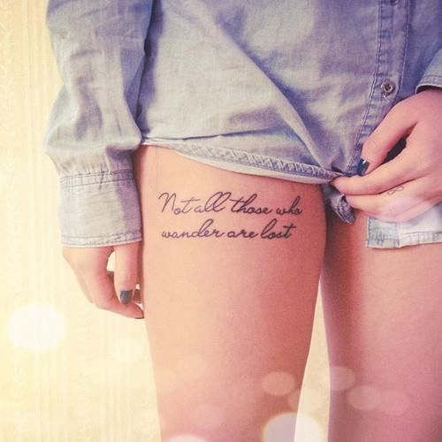 Pretty girl’s quote tattoo on leg