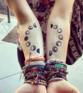 Pretty hands moon tattoo on arm
