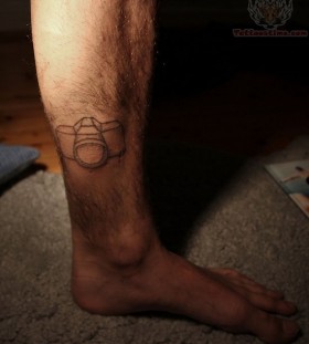 Pretty sweet camera tattoo on leg