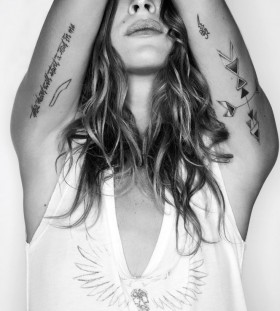 Pretty women quote tattoo on arm