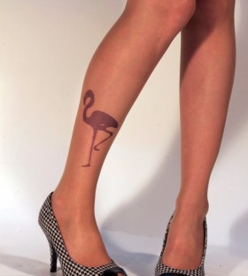 Purple flamingo and bird tattoo on leg