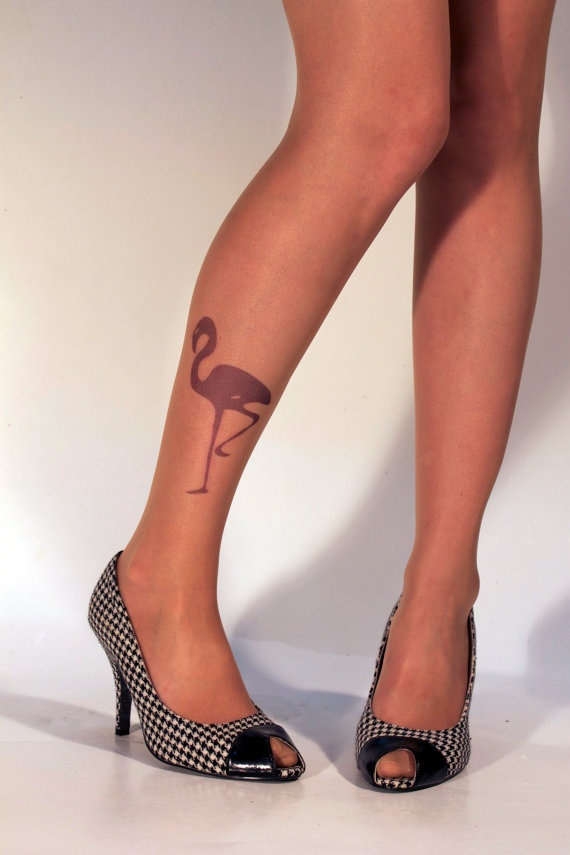 Purple flamingo and bird tattoo on leg