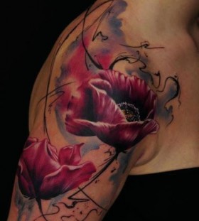 Purple poppy and black shoulder tattoo