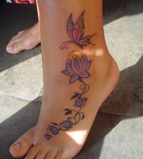 Purple simple butterfly tattoo on leg