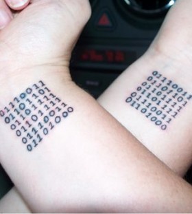 Puzzle black number tattoo on arm