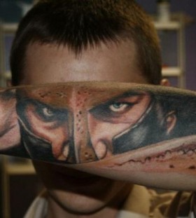 Realistic soldier face tattoo on arm