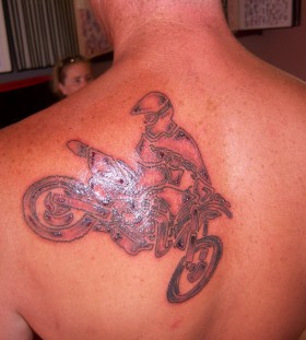 Red amazing bicycle tattoo on back