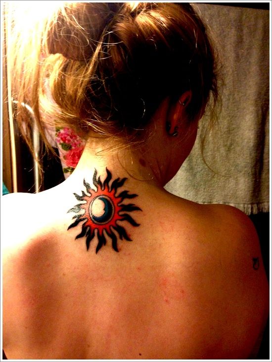 Red and black back sun tattoo