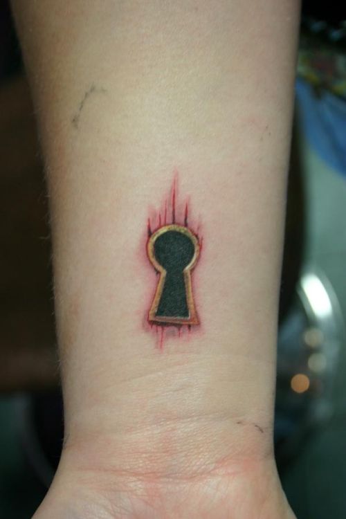Red and black keyhole tattoo