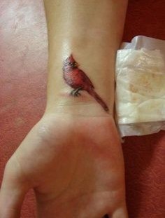 Red bird interesting design tattoo
