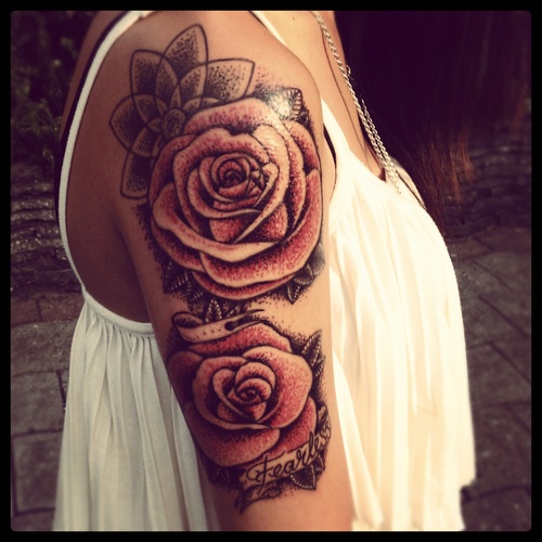 Red cute rose tattoo on shoulder