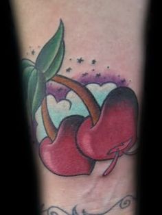 Adorable cherries tattoos on arm