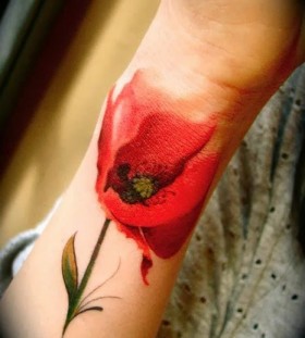 Red flower watercolor tattoo