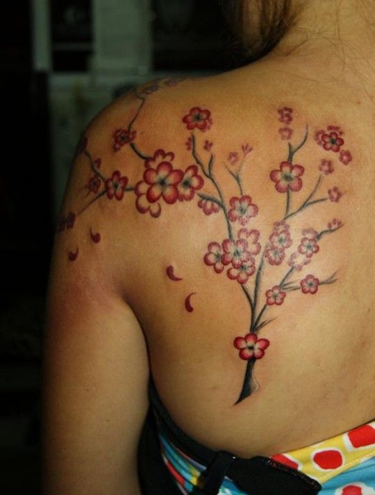 Red flowers tree tattoo on shoulder