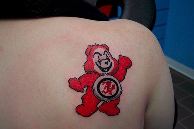 Red lovely bear tattoo on shoulder