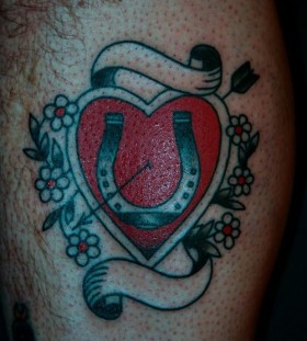 Red lovely horse shoe tattoo