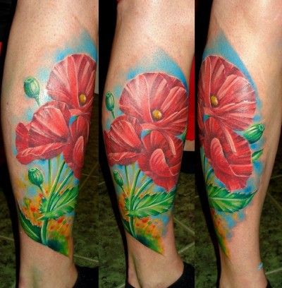 Red lovely poppy tattoo on leg