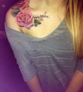 Red lovely rose tattoo on shoulder