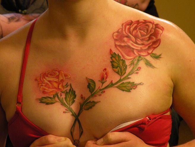 Red rose flower tattoo on chest