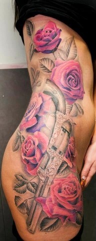 Red roses gun tattoo