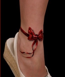 Red simple bow tattoo with shoes