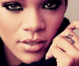 Rihanna’s love quote tattoo on finger