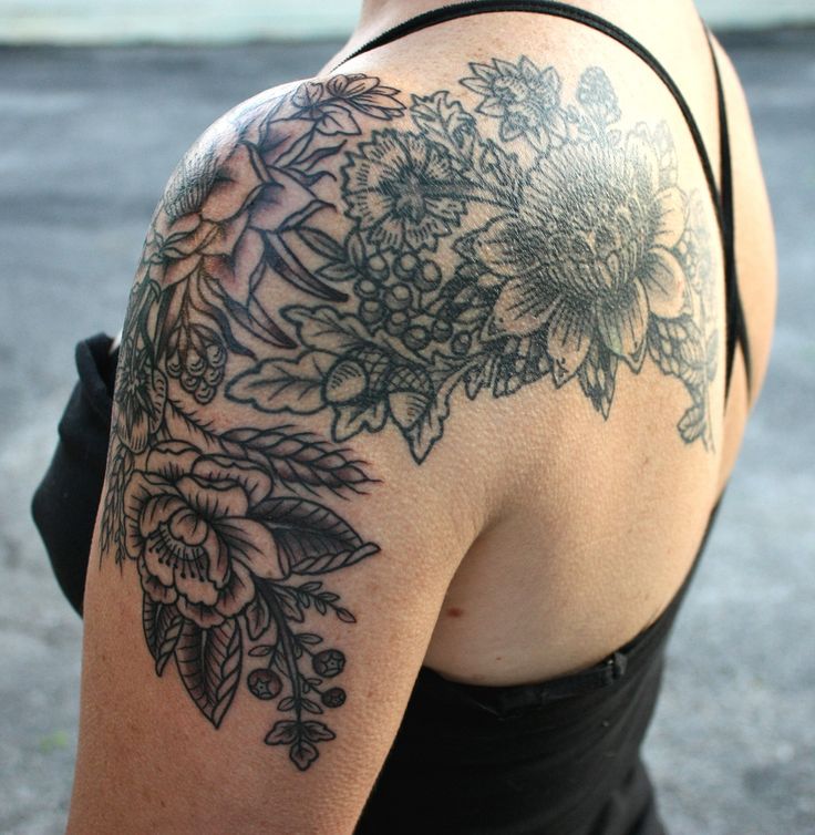 Roses and flowers black shoulder tattoo