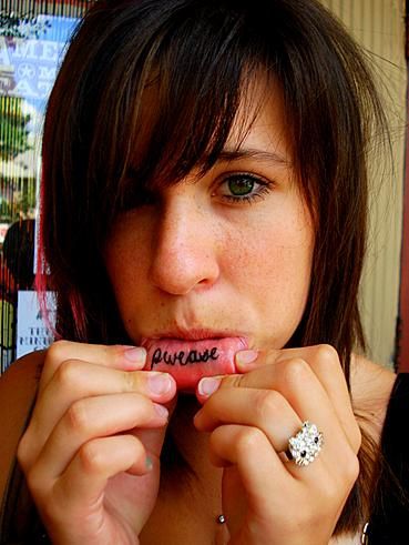 Scary girl lips tattoo