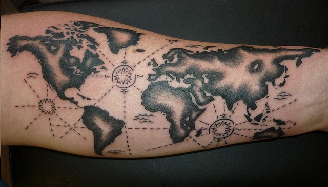 Simple black map tattoo on arm