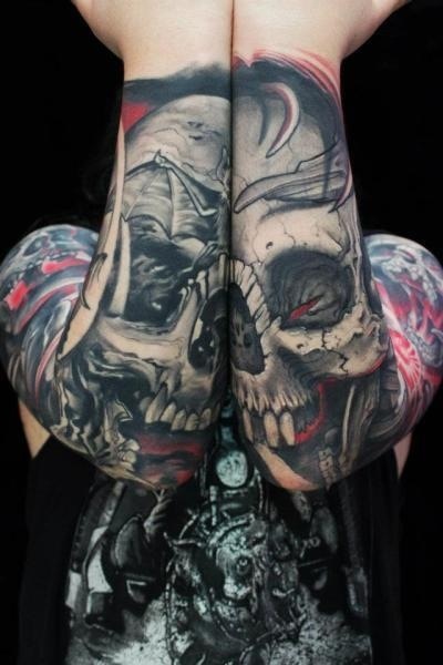 Skull tattoos on shoulder
