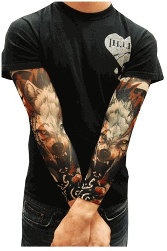 Simple boy wolf tattoo on arm