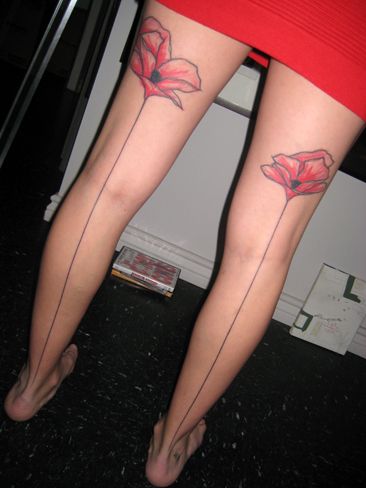 Simple girl poppy tattoo on legs