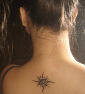 Simple lovely back sun tattoo