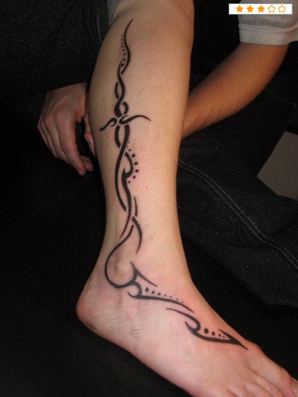 Simple ornaments tribal tattoo on leg