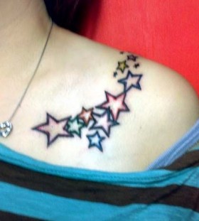 Simple stars tattoo on shoulder