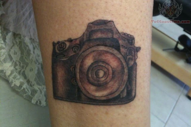 Cameras tattoos on legs