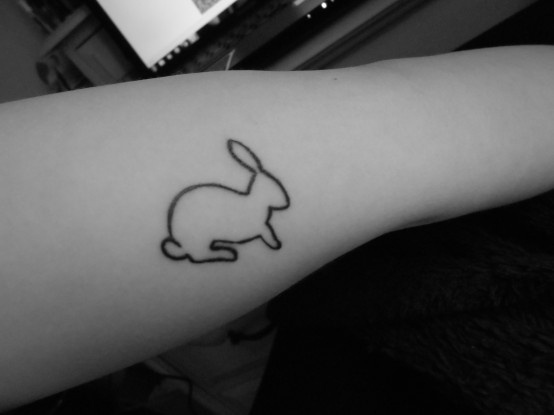 Rabbits tattoos on arm