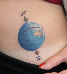 Small globe tattoo