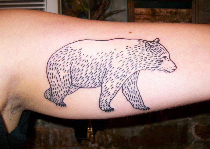 Small lovely bear tattoo on arm