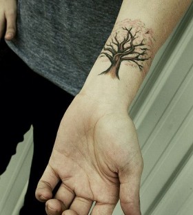 Small lovely tree tattoo on arm