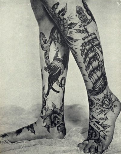 Ships tattoos on legs