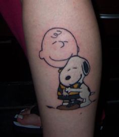 Snoopy tattoo on leg