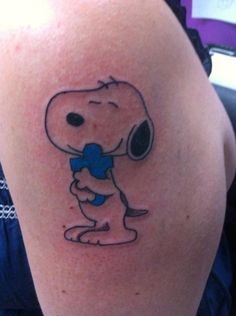 Snoopy with puzzle tattoo