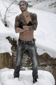 Snow and lovely men's tribal tattoo on arm