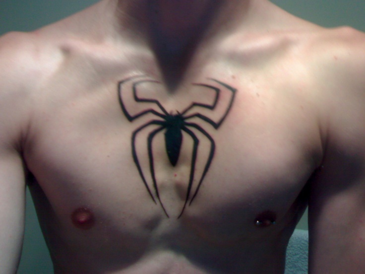 Spider tattoo on man breast
