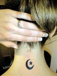 Star and black back moon tattoo