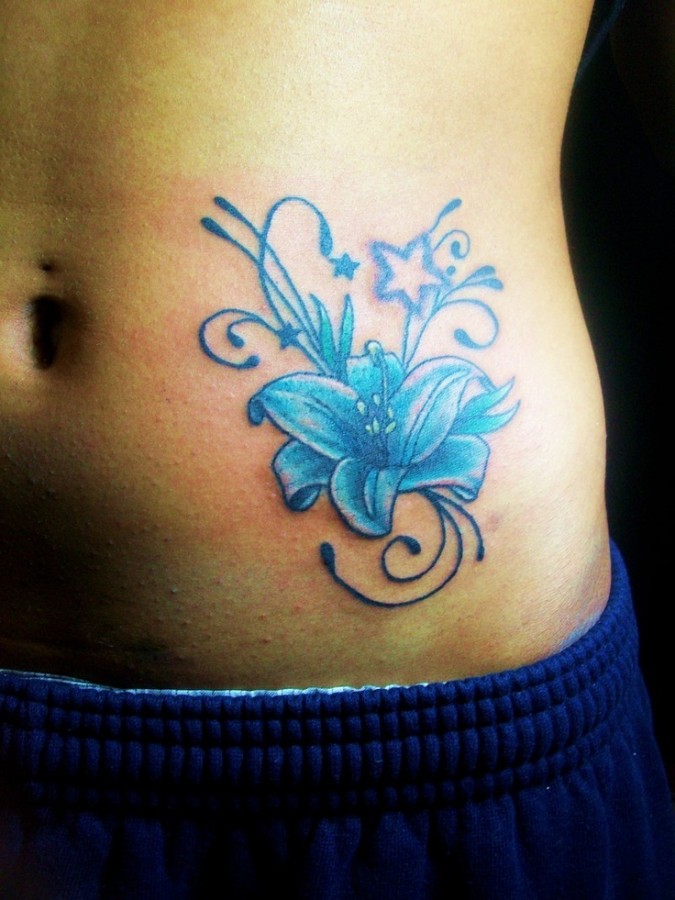 Star and flower blue flowers tattoos