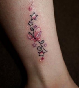 Stars and pink butterfly tattoo on leg